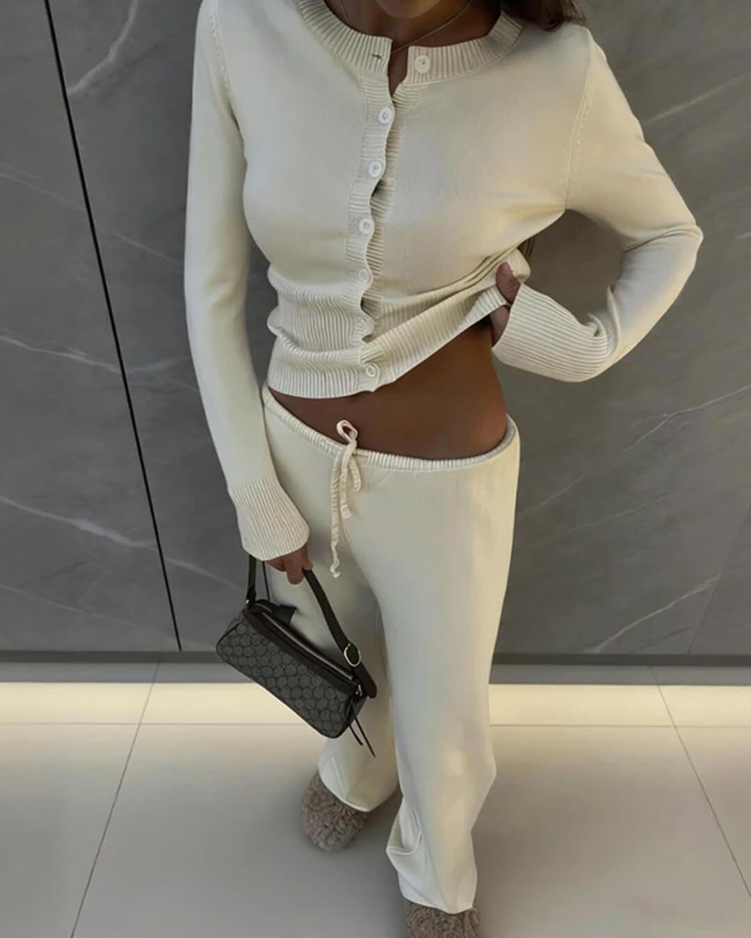 Conjunto Aimee de casaco de malha e calças