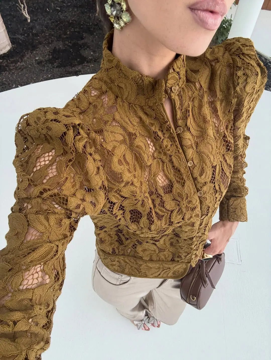 Blusa transparente de renda Azzurra