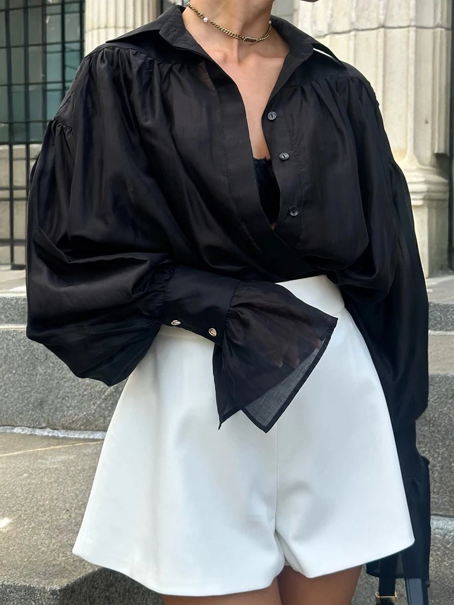 Blusa transparente com botões Brielle