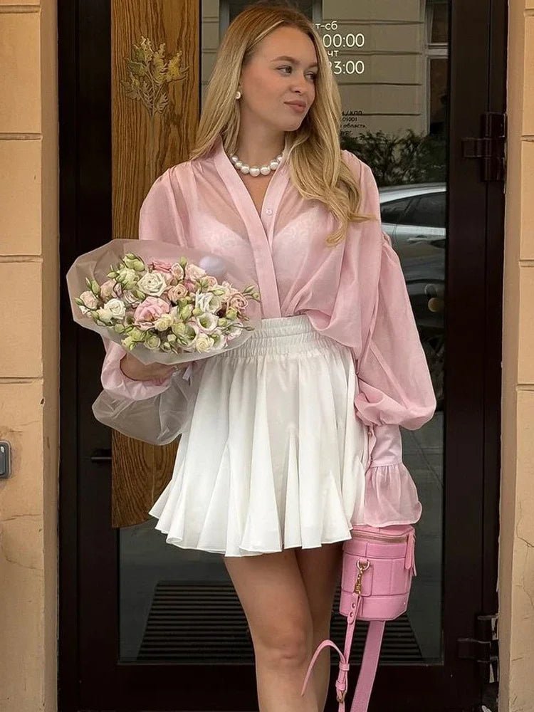 Blusa transparente com botões Brielle