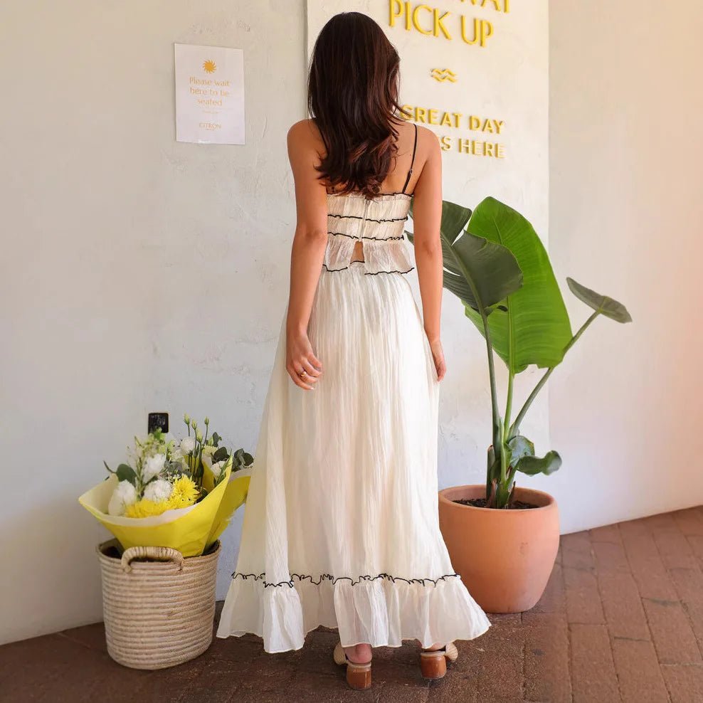 Conjunto Celeste de top com alças e laço e saia fairy plissada