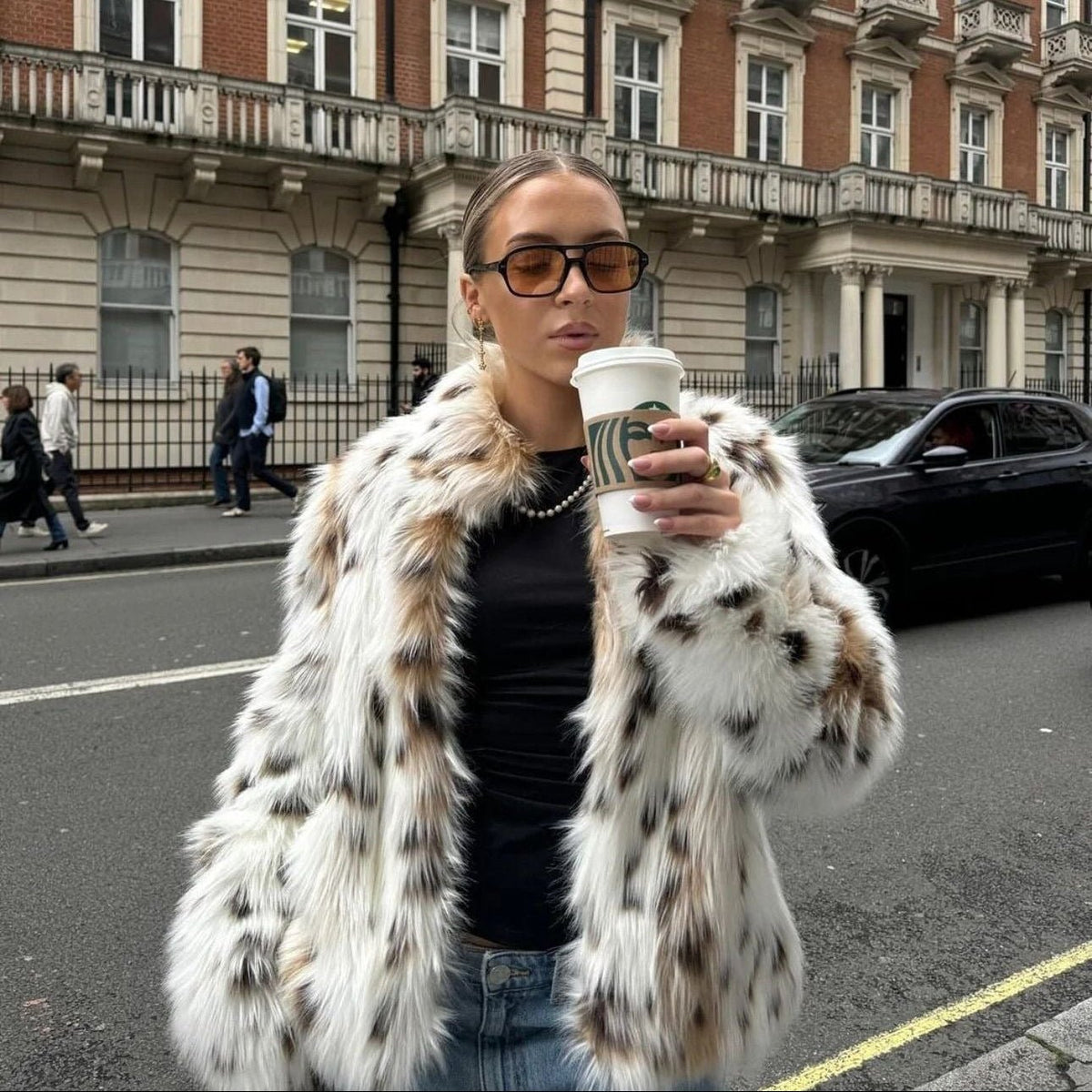 Casaco em pelo sintético com padrão leopardo Celeste