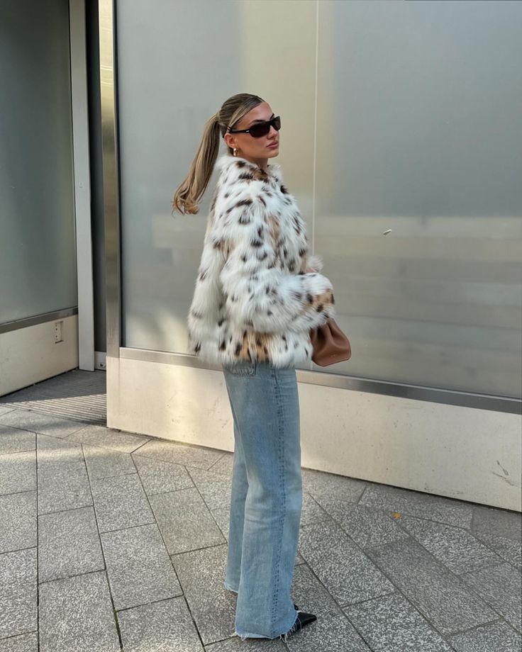 Casaco em pelo sintético com padrão leopardo Celeste