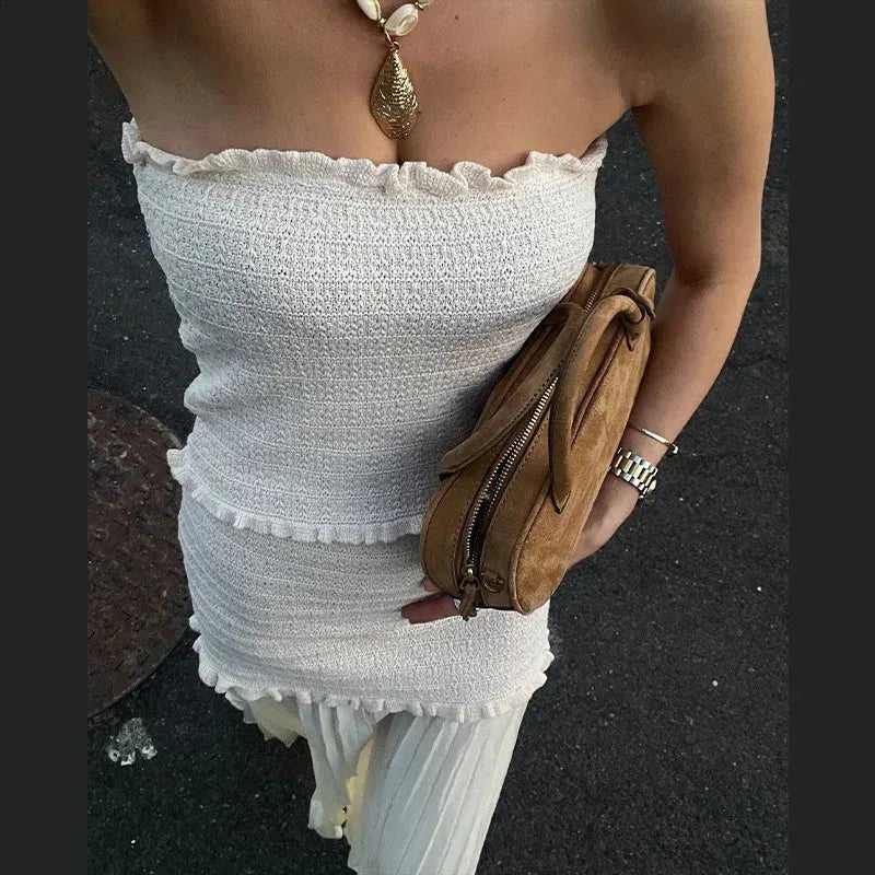 Conjunto Claudia de camisola de malha e saia plissada