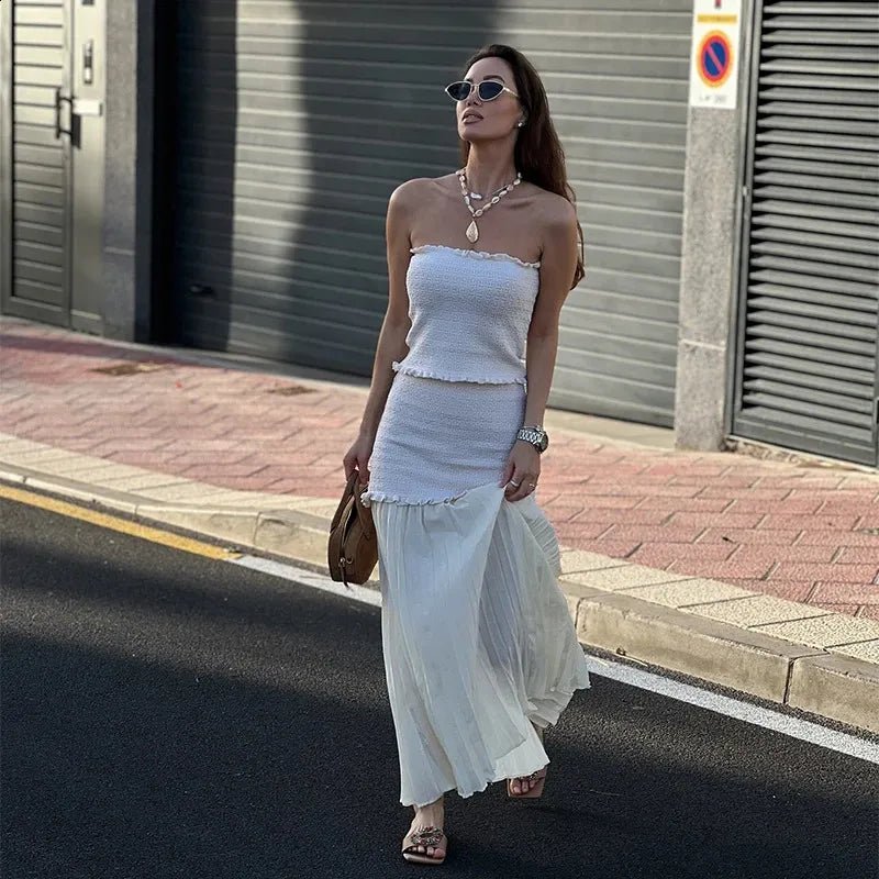 Conjunto Claudia de camisola de malha e saia plissada