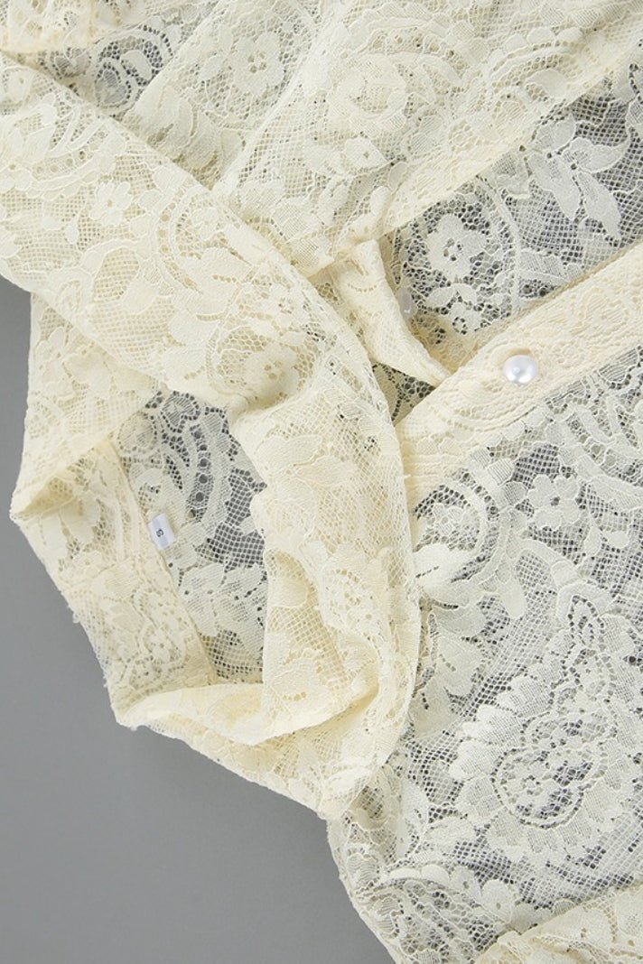 Blusa de renda transparente com laço Dunja