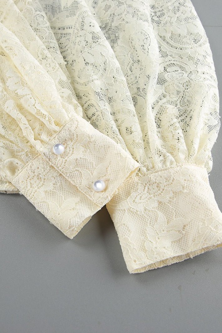 Blusa de renda transparente com laço Dunja