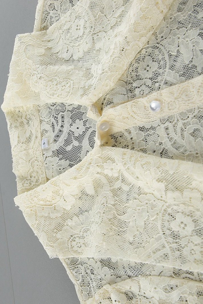 Blusa de renda transparente com laço Dunja