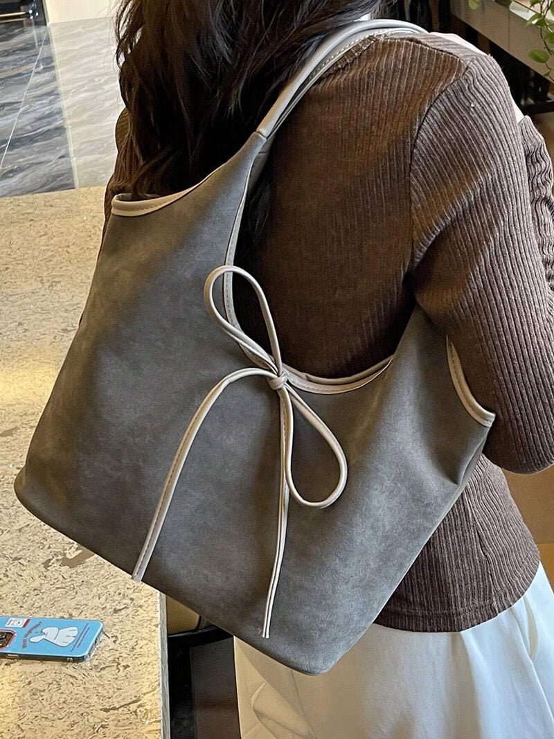 Mala com laço em camurça Florence
