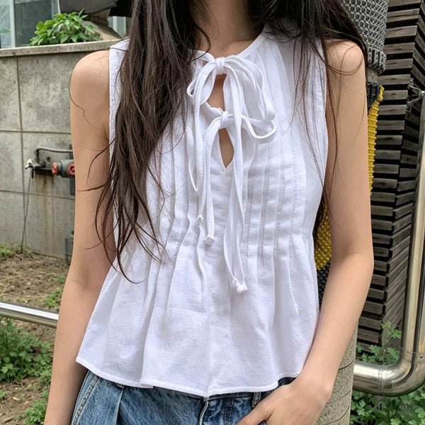Top Honora com bainha de folhos e atilhos à frente