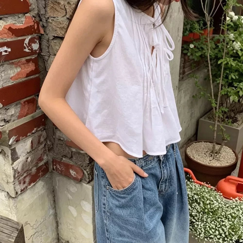 Top Honora com bainha de folhos e atilhos à frente