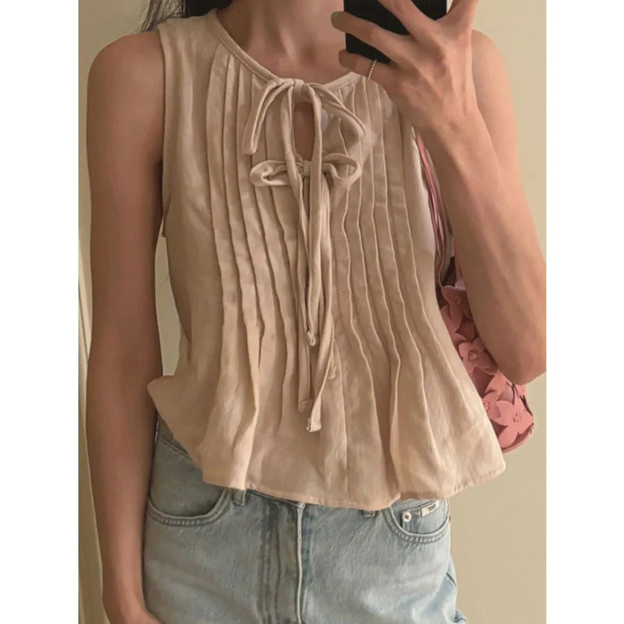 Top Honora com bainha de folhos e atilhos à frente
