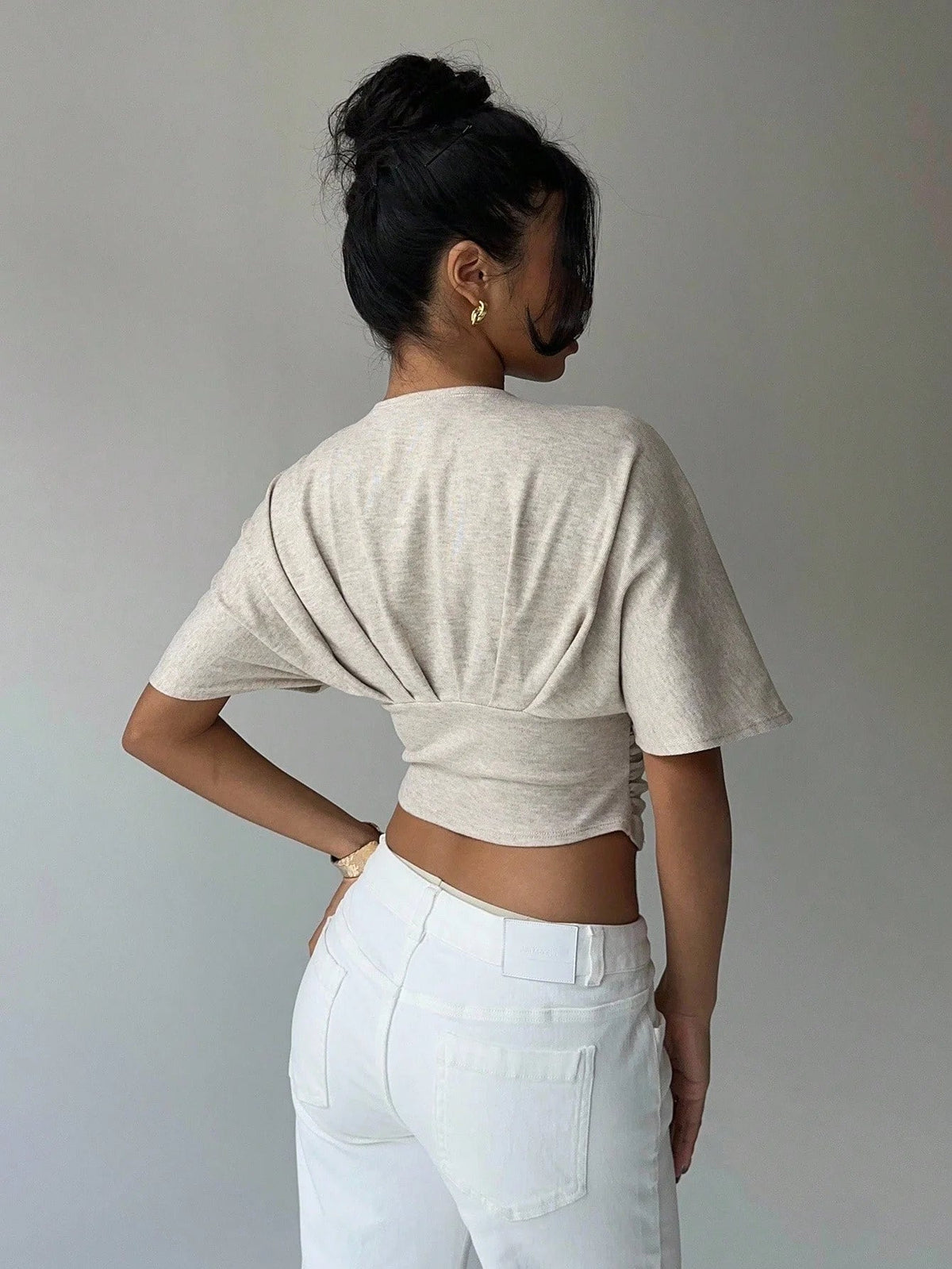 Blusa justa com decote profundo Kendra