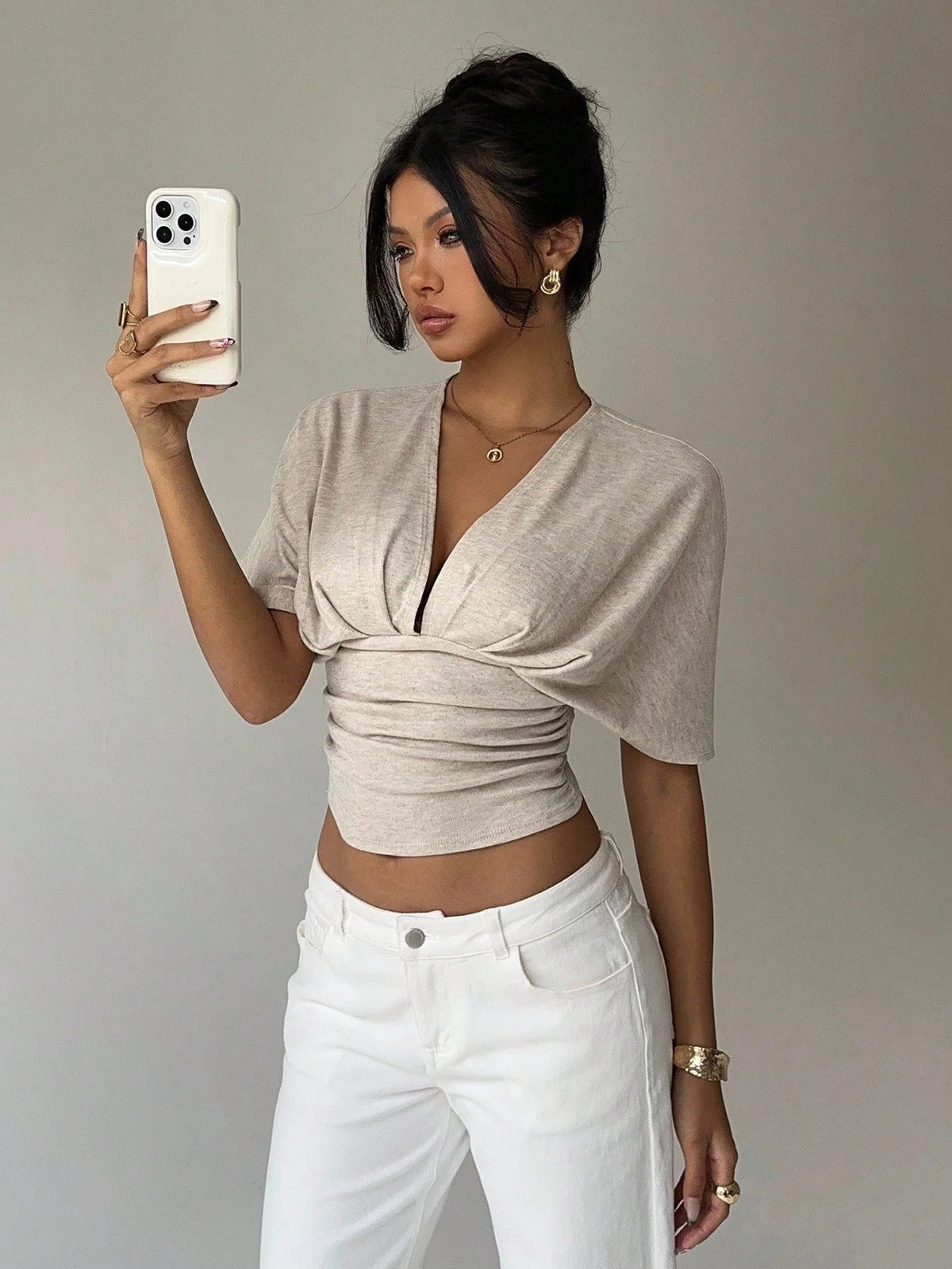 Blusa justa com decote profundo Kendra