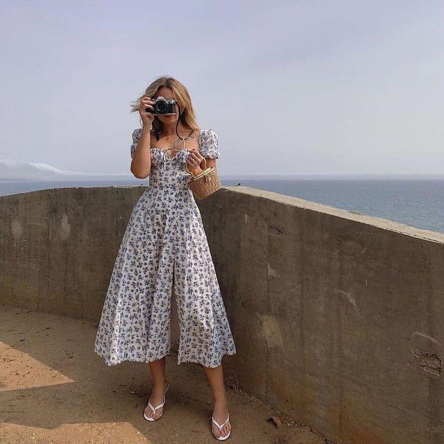 Vestido midi floral com mangas balão Lena