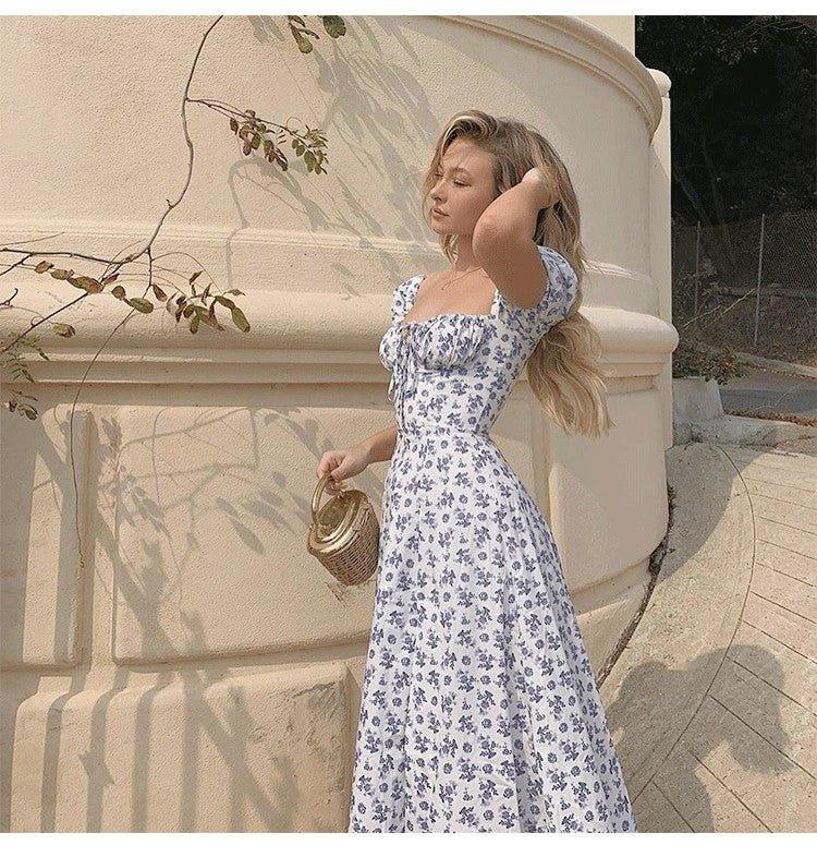 Vestido midi floral com mangas balão Lena