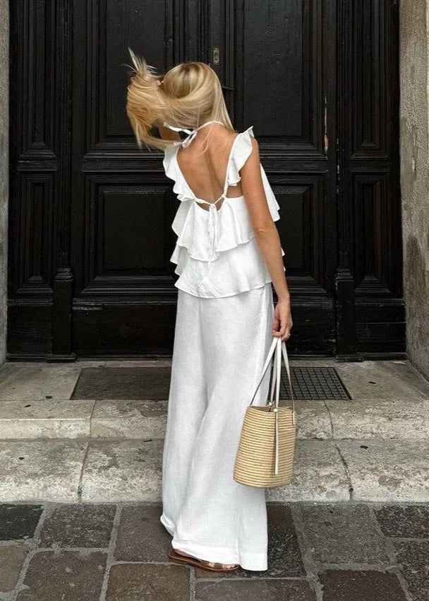 Conjunto Mila de top fluido com folhos e calças de perna larga