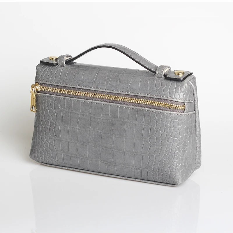 Clutch Minerva com padrão de crocodilo