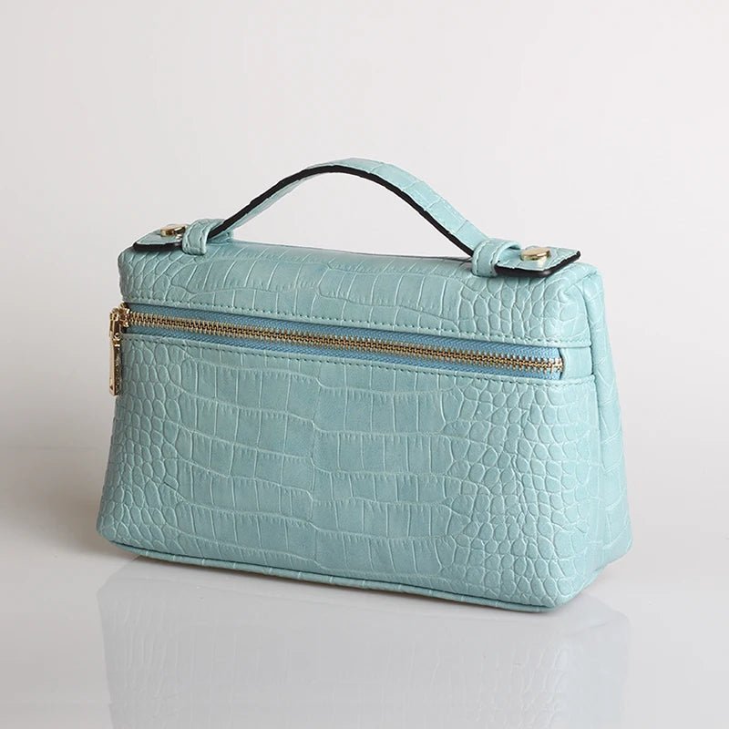Clutch Minerva com padrão de crocodilo