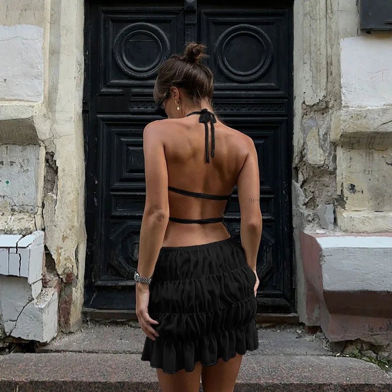 Conjunto Priya de top de alças com laço e saia plissada