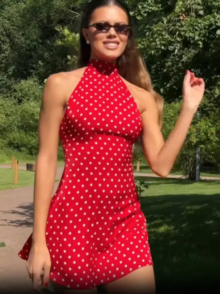 Vestido mini às bolinhas com decote halter Renee