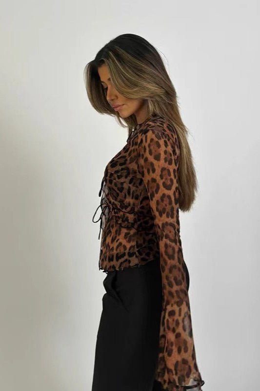 Blusa transparente com padrão leopardo Siena
