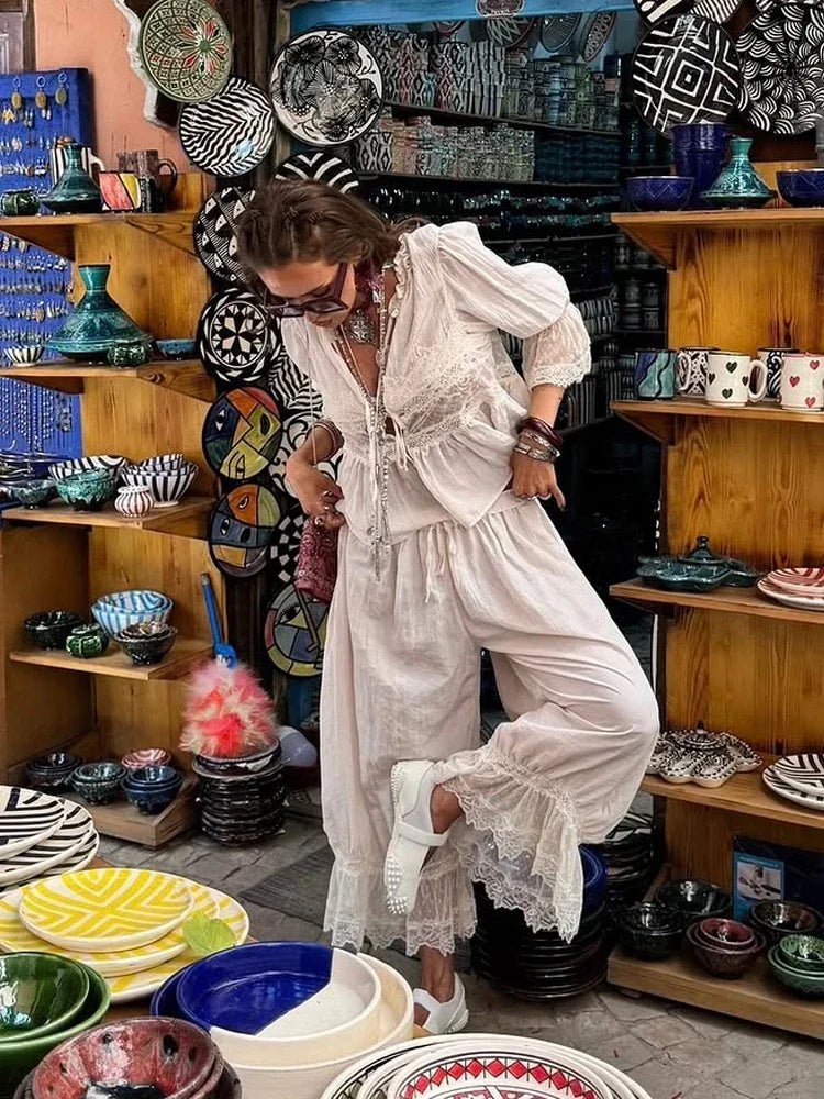 Fato Sophia de renda com mangas-lanterna