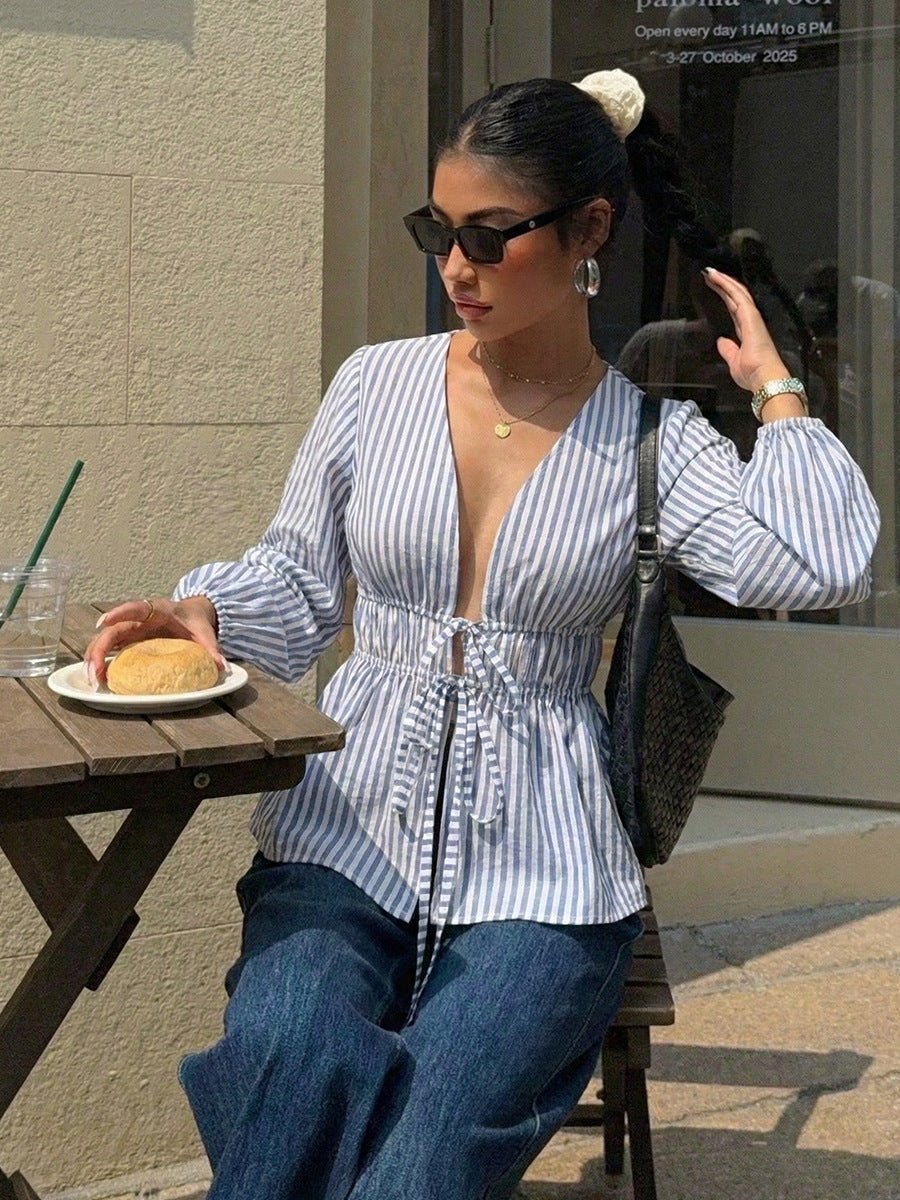 Blusa às riscas com laço à frente Yelena